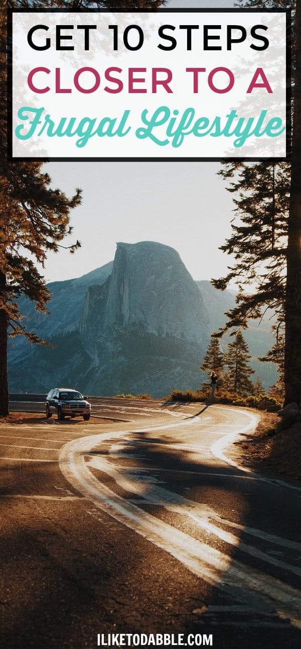 Image of car driving down highway with mountains and forest in the background with title "Get 10 steps closer to a frugal lifestyle" Frugal lifestyle. Frugal living. Thrift living. Living on less. Saving more. Finance
