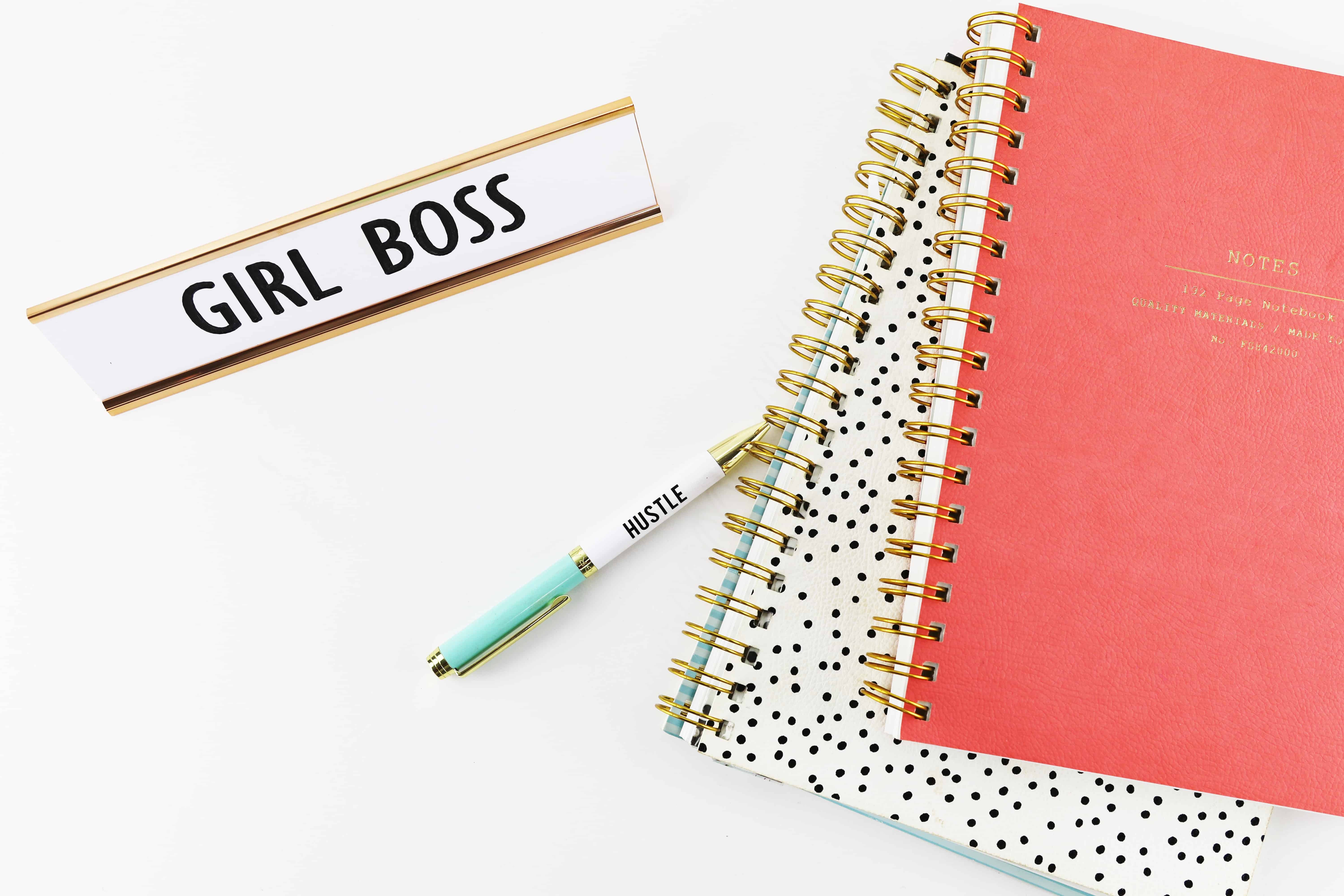 girl boss hustle with pen, journal and notebook image