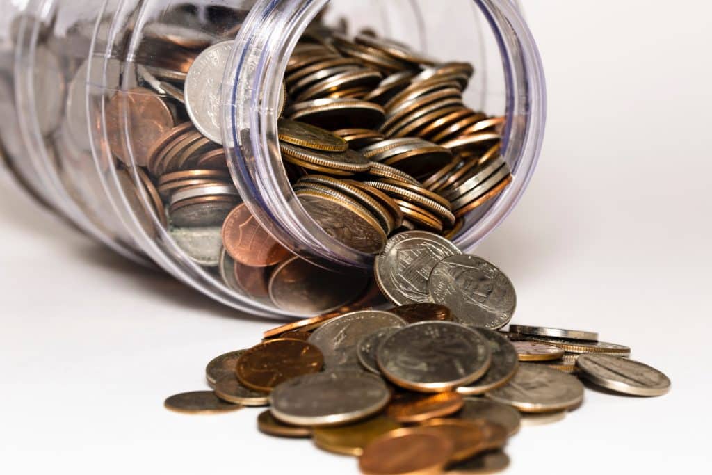 money saving challenge jar of coins image