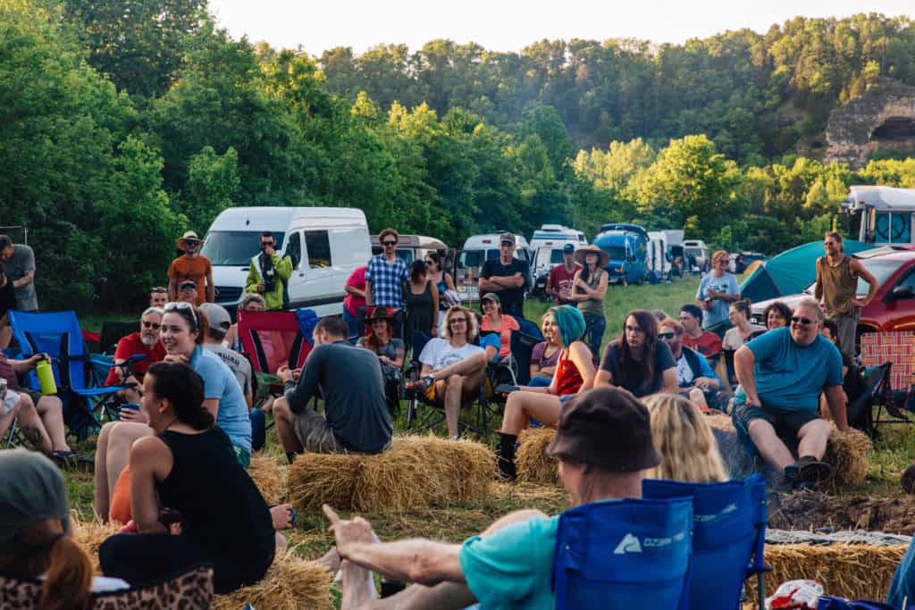 Midwest vanlife gathering 2019 fundraiser in post image 3. Image of people gathered around their vans.