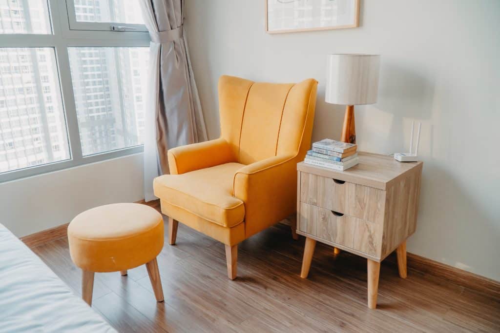 easiest items to flip for a profit furniture. Image of yellow furniture in a condo