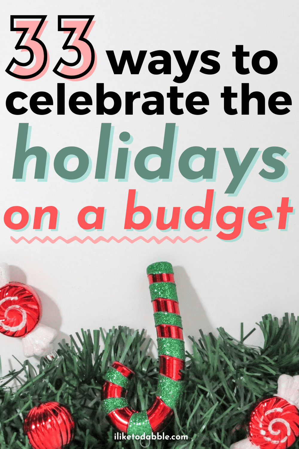 Christmas decorations on a table with text that reads: 33 ways to celebrate the holidays on a budget