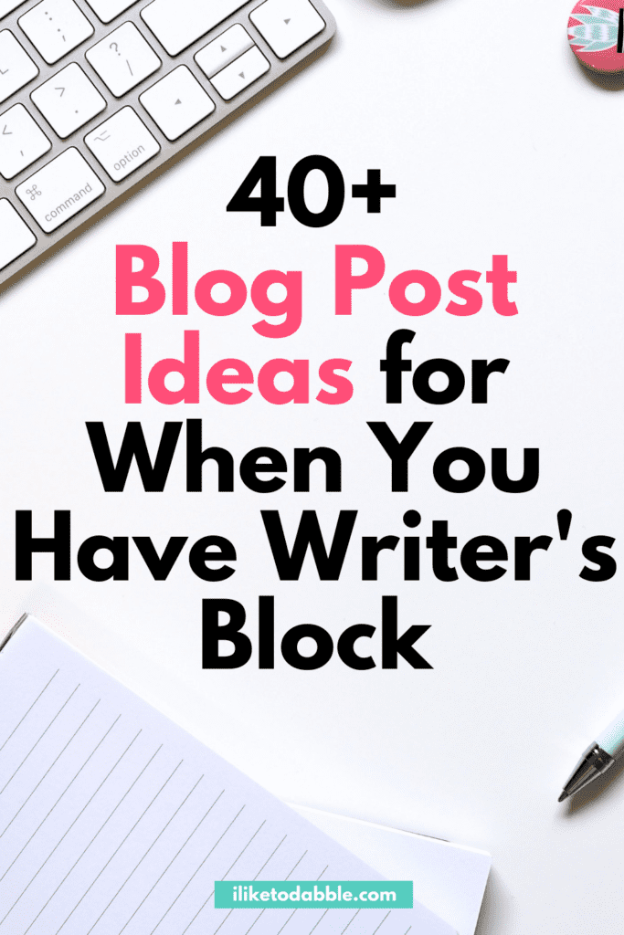 Items on a desk with a notepad and text overlay that reads: 40+ blog post ideas for when you have writer's block