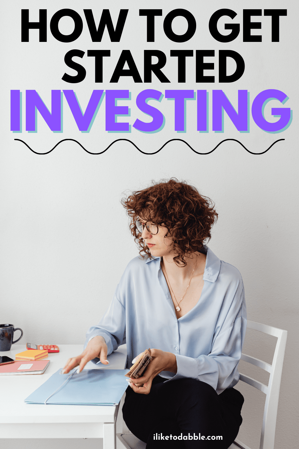 person sitting at a table learning how to get started investing